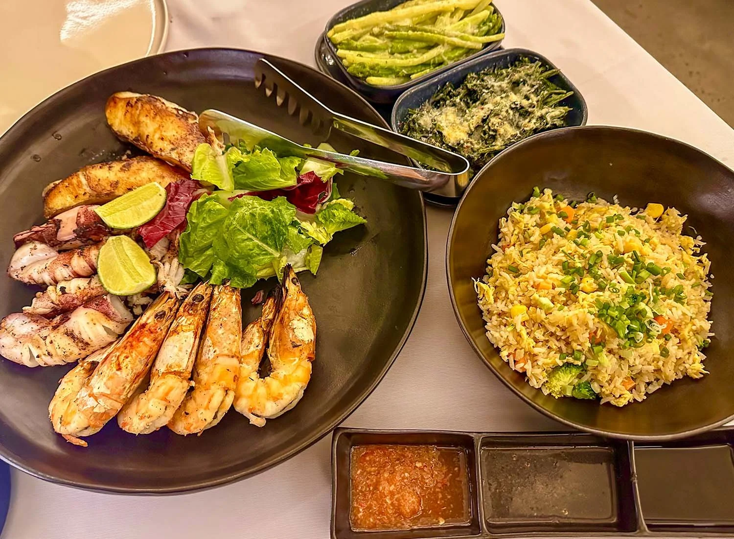 A grilled seafood lover’s dinner at Crab & Co, Kep West, Cambodia.