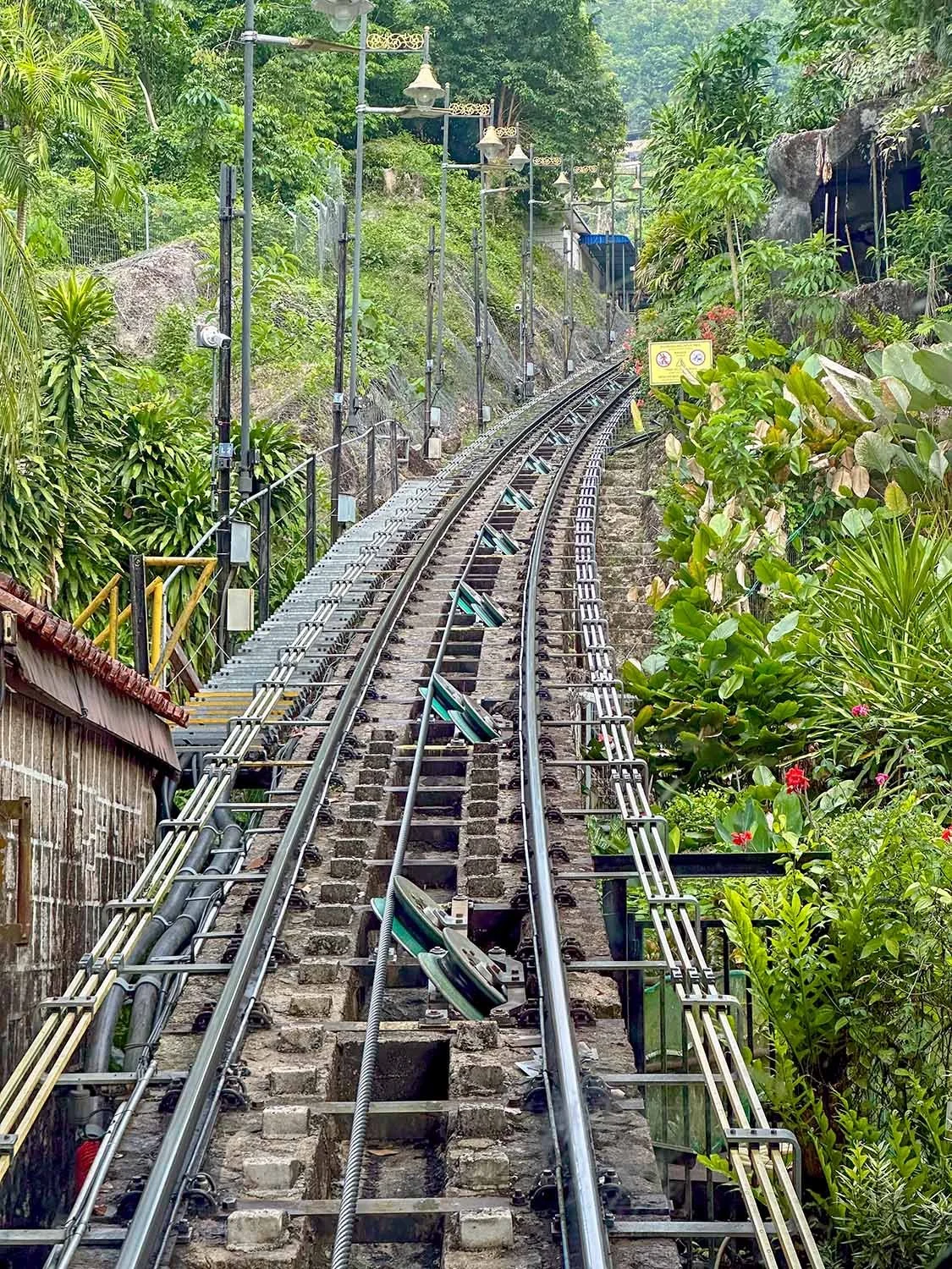 View of the funicular railway line up Penang Hill on Penang Island, Malaysia, from the front of a train.