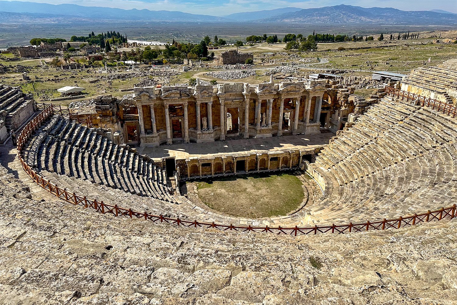 Wide view of the Roman amphitheatre at the Hierapolis Ancient City looking down from the top.