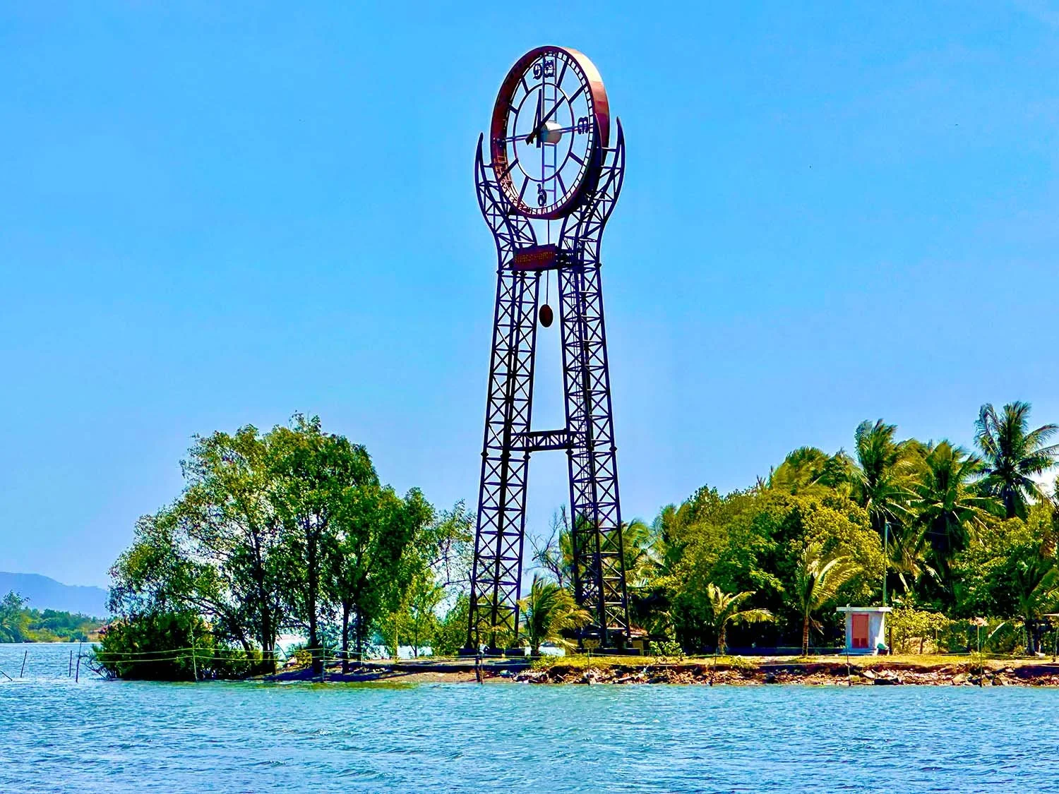 Clock Tower of Peace on Fish Island, Kampot, Cambodia..