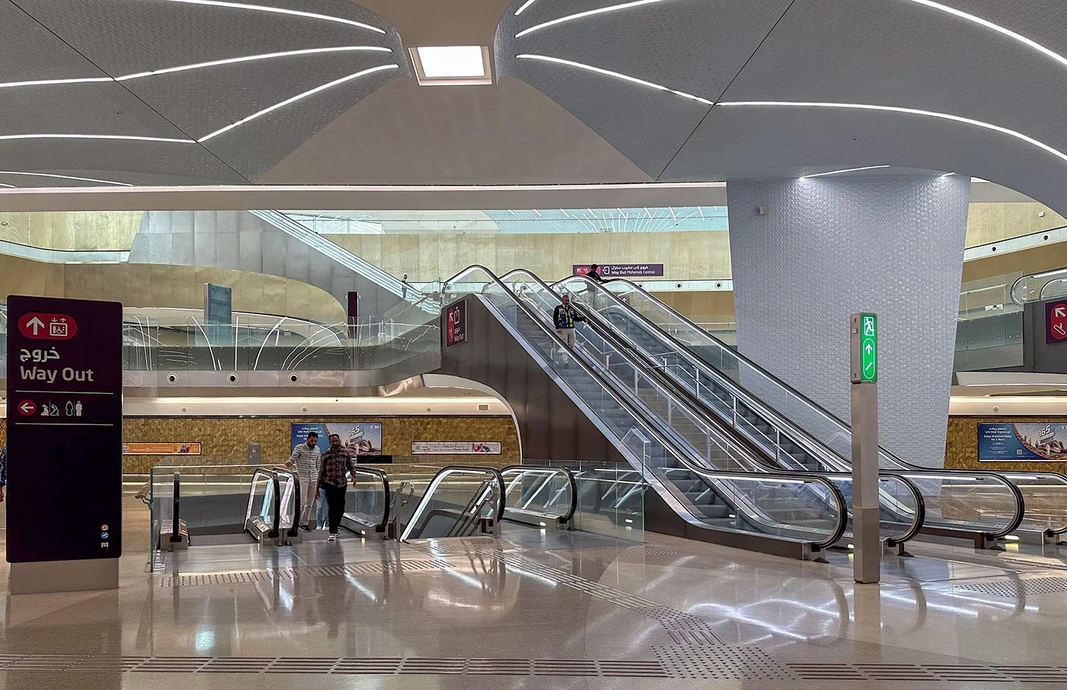Interior view of a clean and modern Metro station in Doha, Qatar.