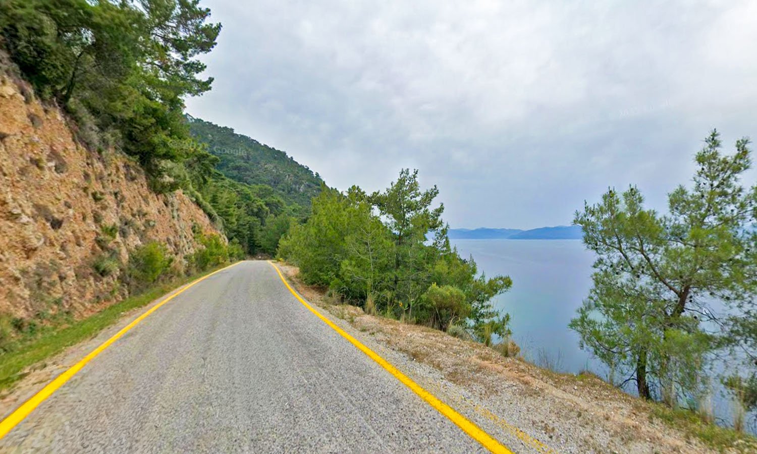 A deserted stretch of a coastal road on the Turkish Riviera between Oren and Akyaka, Türkiye.