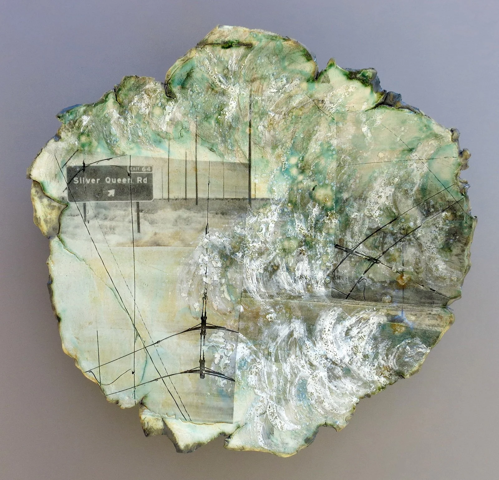  SILVER QUEEN RD Cone 5 clay, oxides, Litho-type transfers, glaze, decals 18“x17“x3.5“&nbsp;&nbsp;&nbsp;&nbsp;&nbsp;&nbsp; 2014 