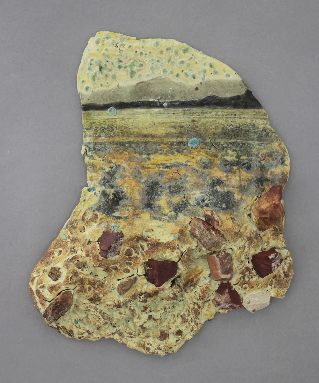 ANOTHER COUNTRY Cone 5 clay, litho transfer, oxides, glass, rocks, glaze, epoxy 13”x12”x2.5”     2026 