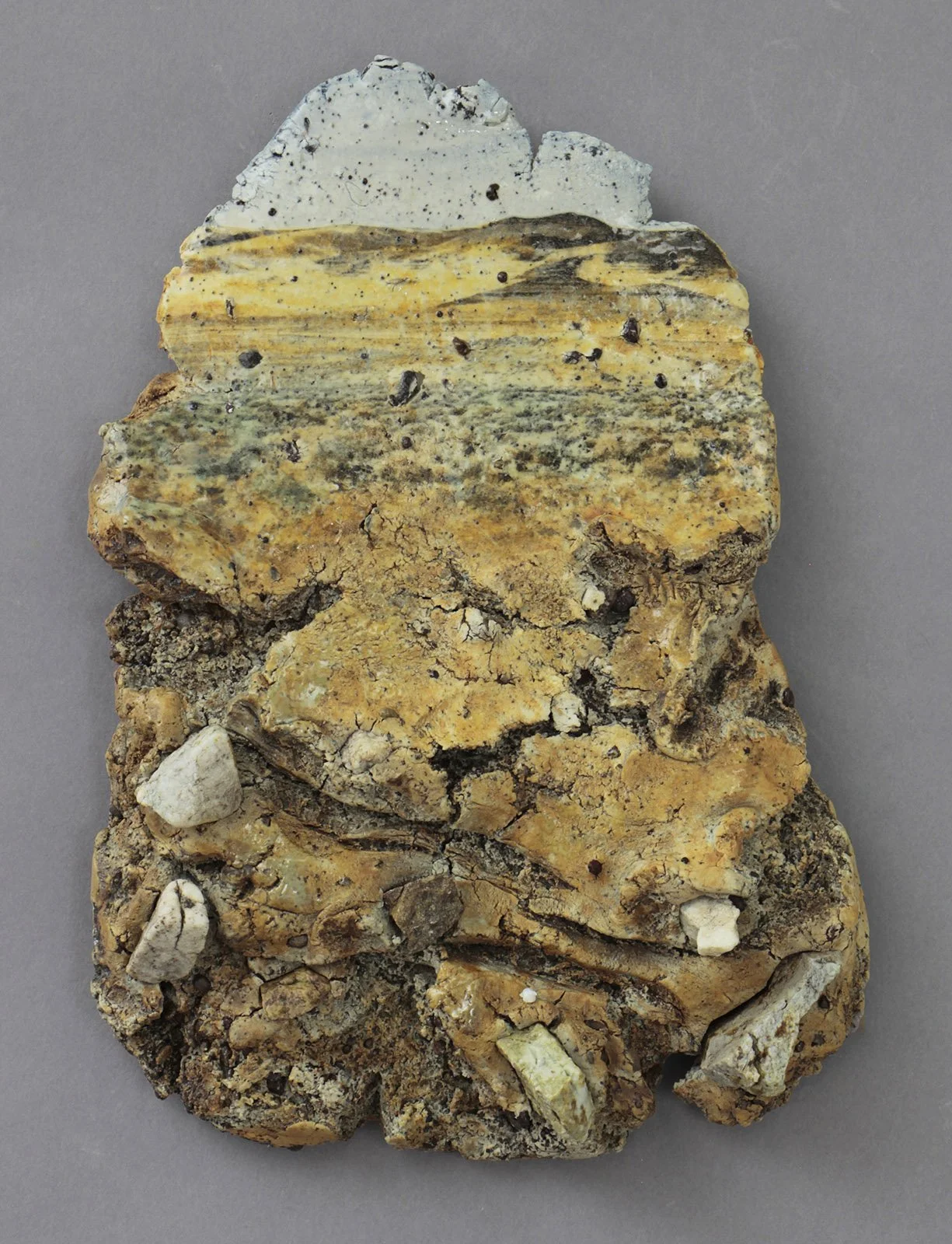  OCHRE PERSPECTIVE Cone 5 clay, litho transfer, rocks, oxides, glaze, epoxy 9.5”x7”x2”     2026 