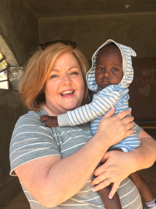 Mrs. Beth holding one of the cutest members of the Potter & Clay family, LoLo.