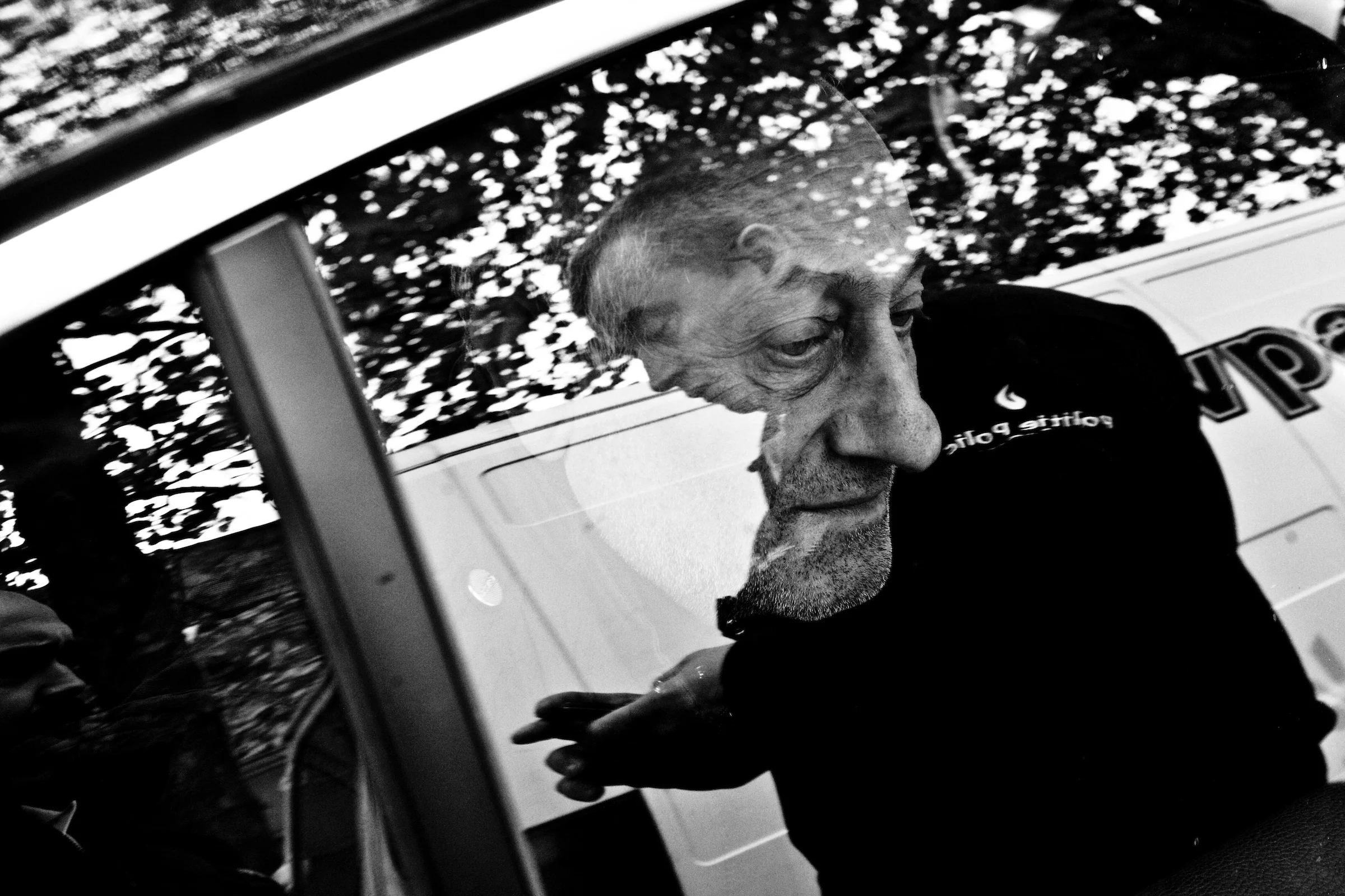 Portrait of a suspect in a police car, during a control of the police on his vehicle, Brussels, Belgium on may 2010.