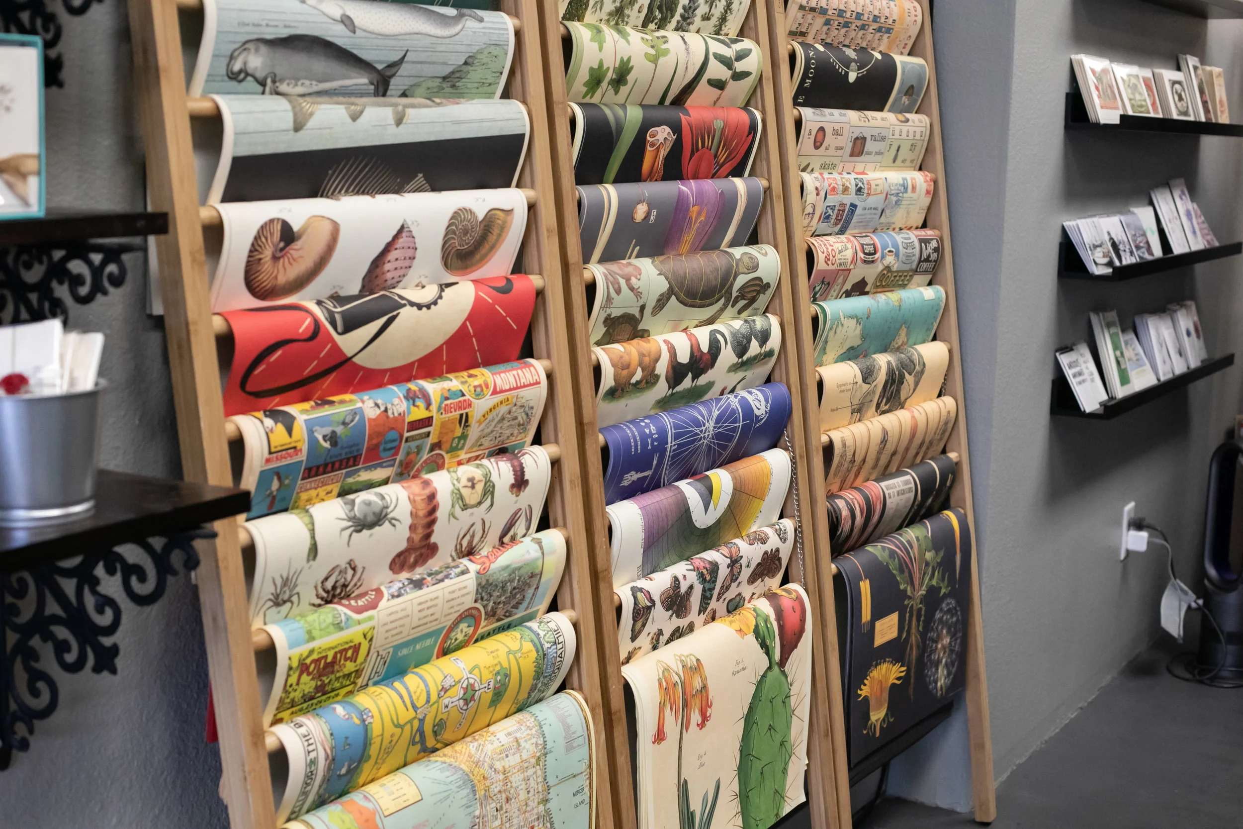 One wall is full of poster prints. 