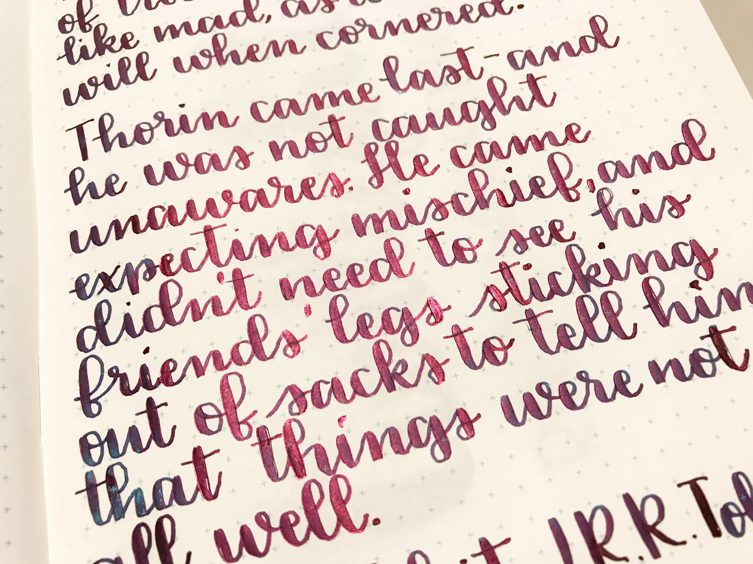 I used a Pilot 912 FA with Organics Studio Emerson . The ink is blue with dark pink sheen.
