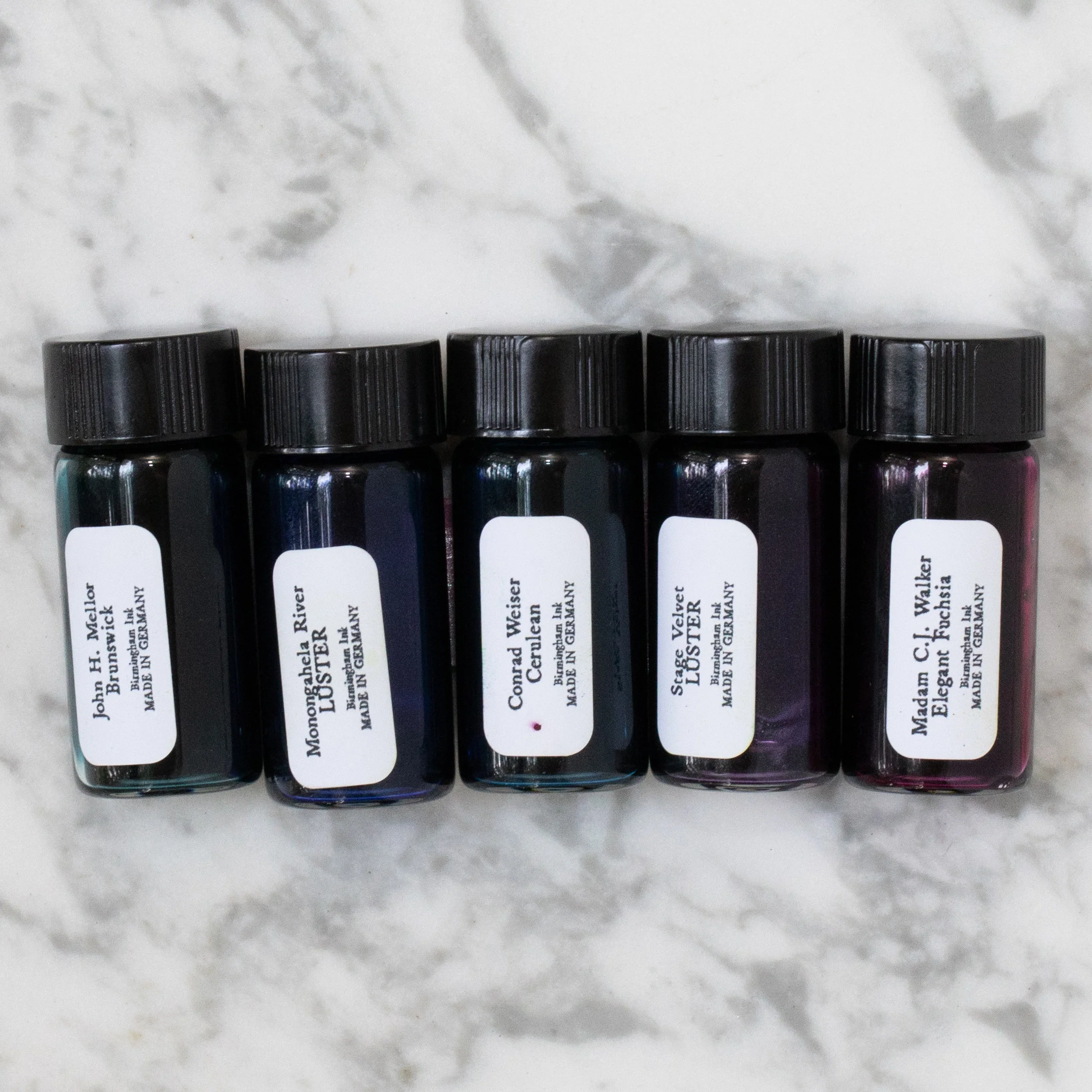 I'm so happy to say that Birmingham Pens got new sample bottles. These new ones are a bit bigger, but I love that they are still glass. The new ones do not have that plastic stopper like the old ones that spit ink everywhere, so I'm very happy with them.
