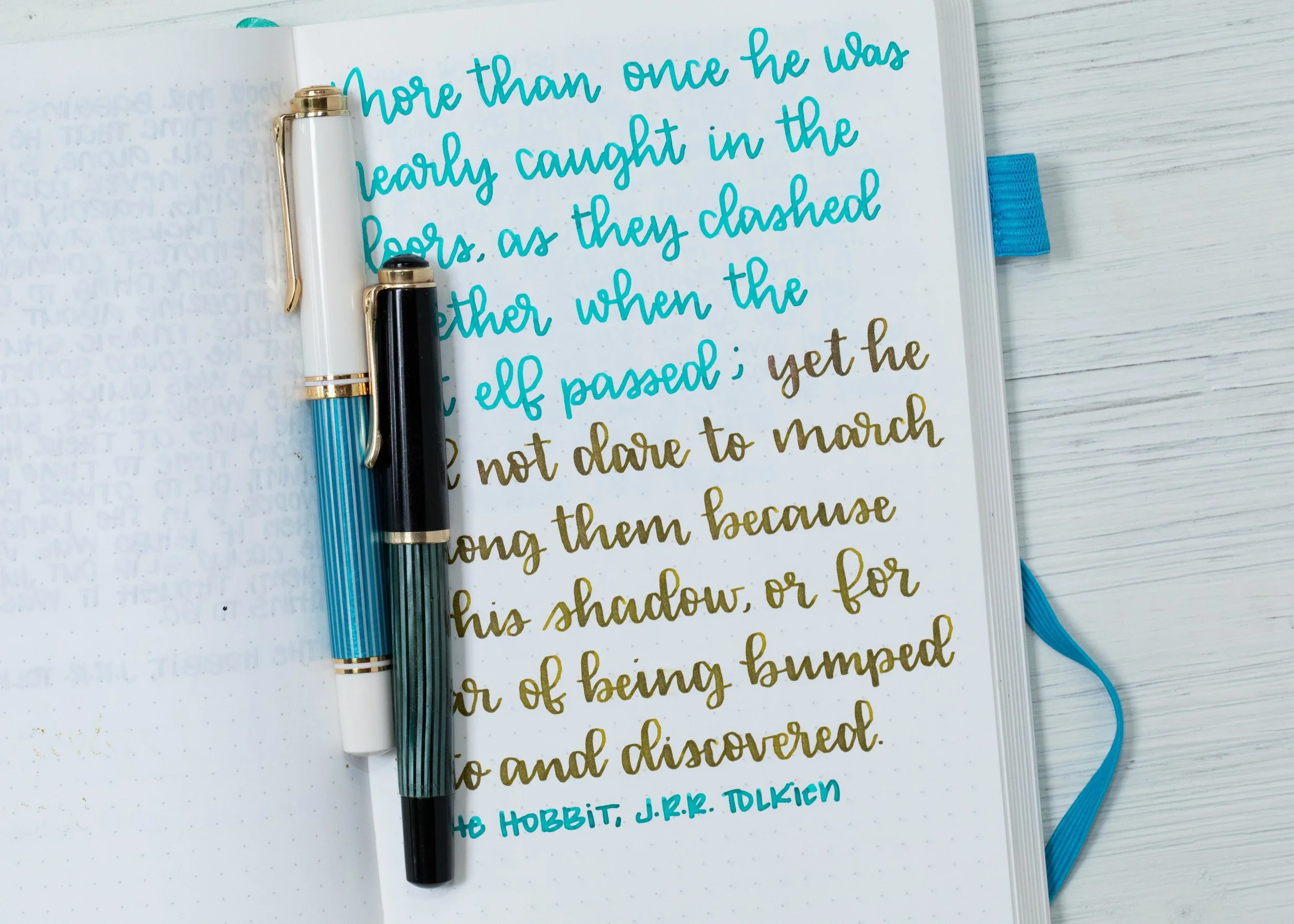 I used a broad Pelikan M600 Turquoise and a Pelikan 400N on an ivory Hippo Noto Notebook. The inks had an average flow.