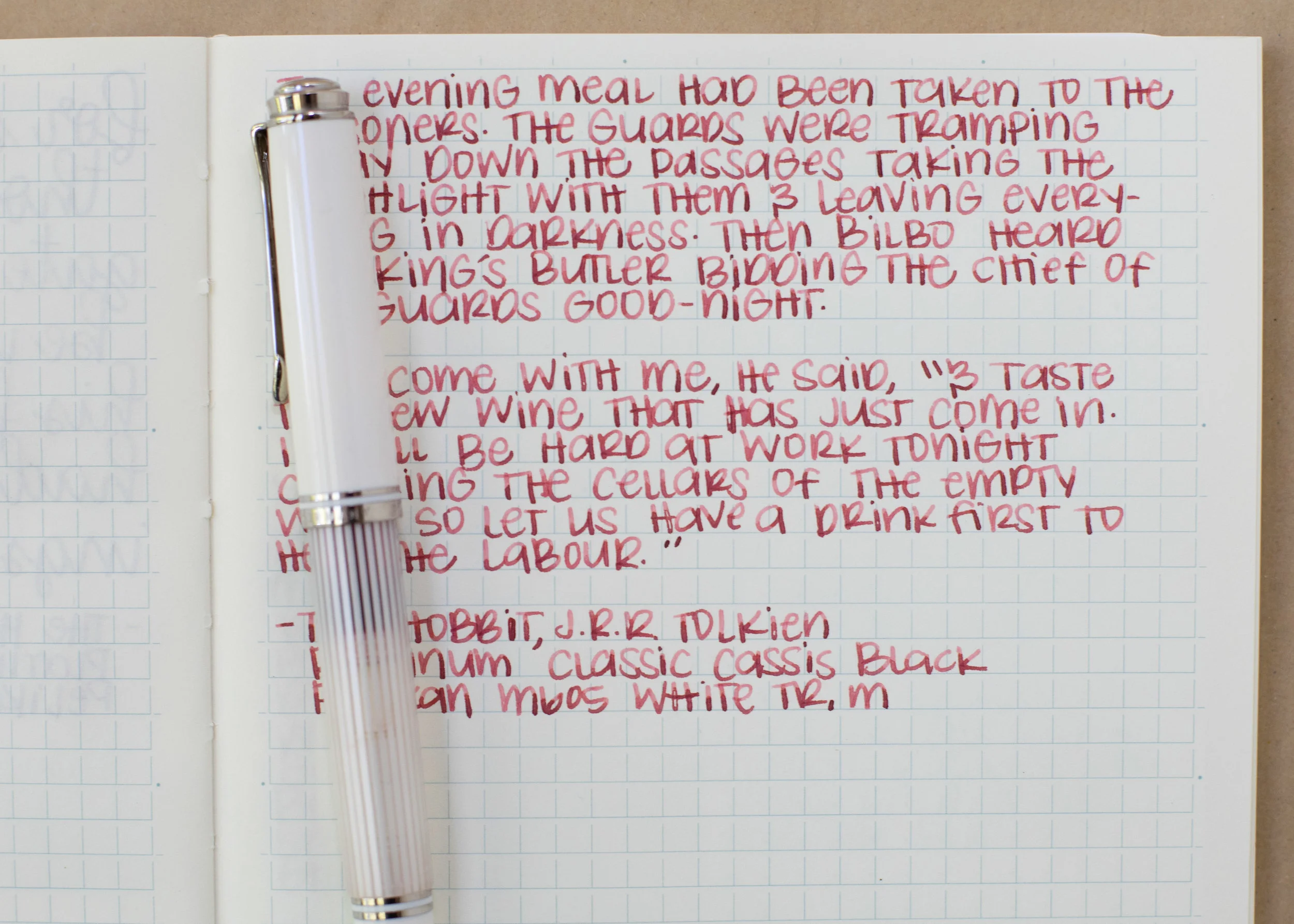 I used a medium Pelikan M605 White Transparent on a Midori MD notebook. The ink had a dry flow.