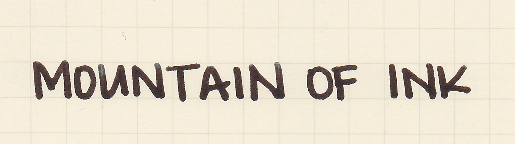 All Caps, written with a broad nib.