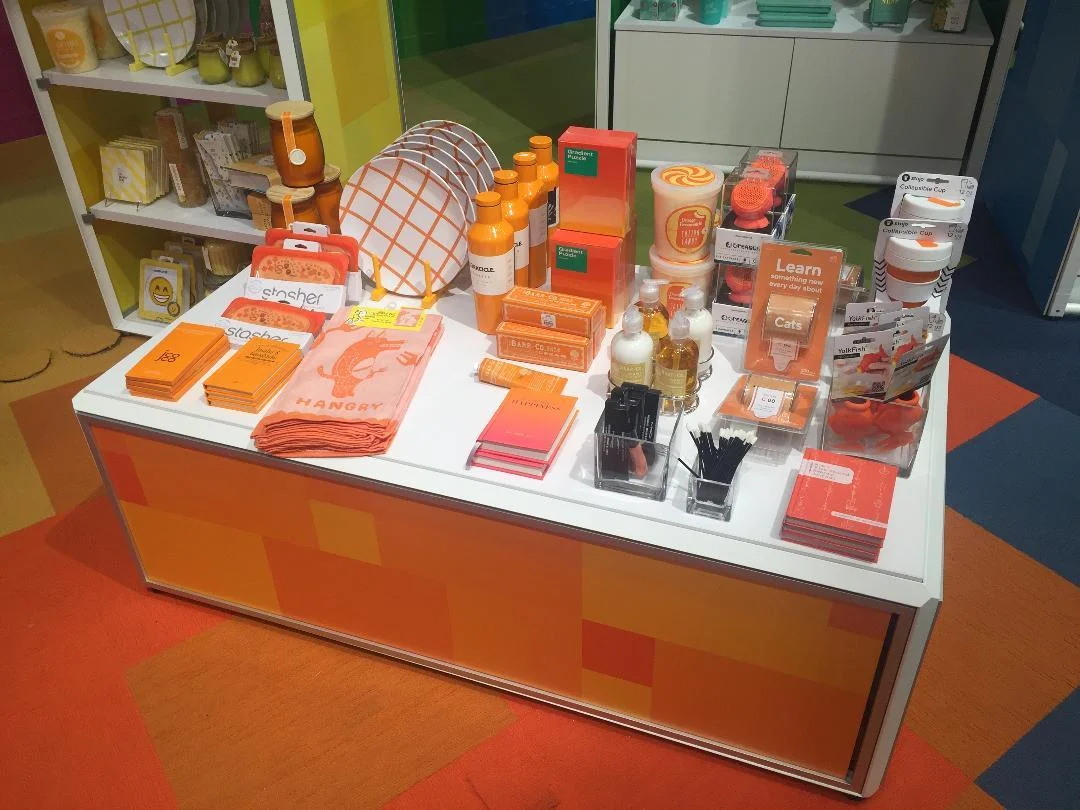 Curated merchandise is displayed by color, here a group of orange wares, at the STORY at the Macy's at the Willowbrook Mall in Wayne, one of four of the new in-store shops located in New Jersey. Photo: Linda Moss for CoStar