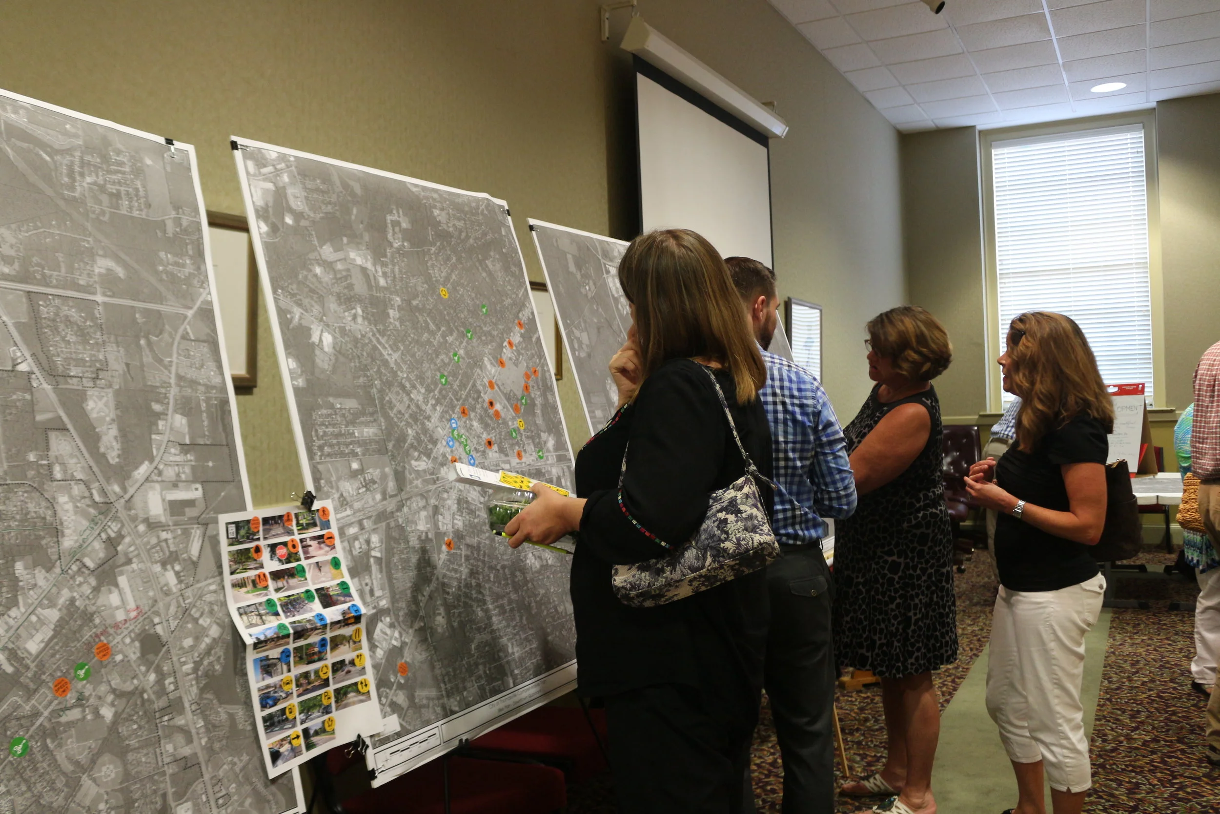 Gathering thoughts and feedback at open houses.