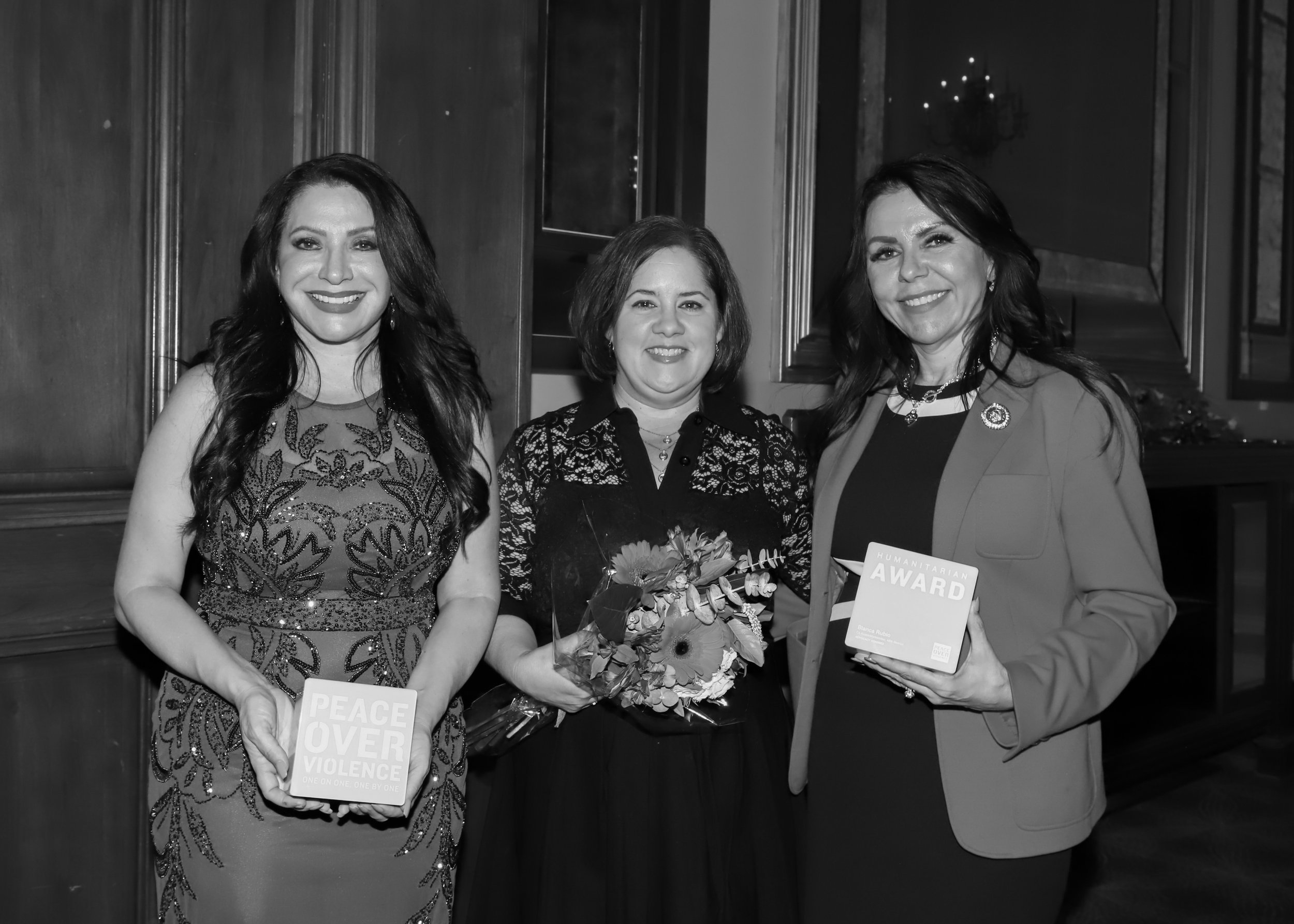 Honorees Blanca Rubio and Susan Rubio with presenter Ana Estevez