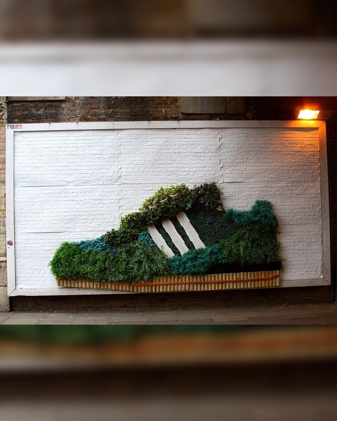 A few years back, @adidas launched their eco-friendly sneaker line called Gr&uuml;n, and they marked the occasion by creating an innovative billboard made entirely of sustainable materials and plants. #sustainablefashion

📸 by @dailyadcoffee
