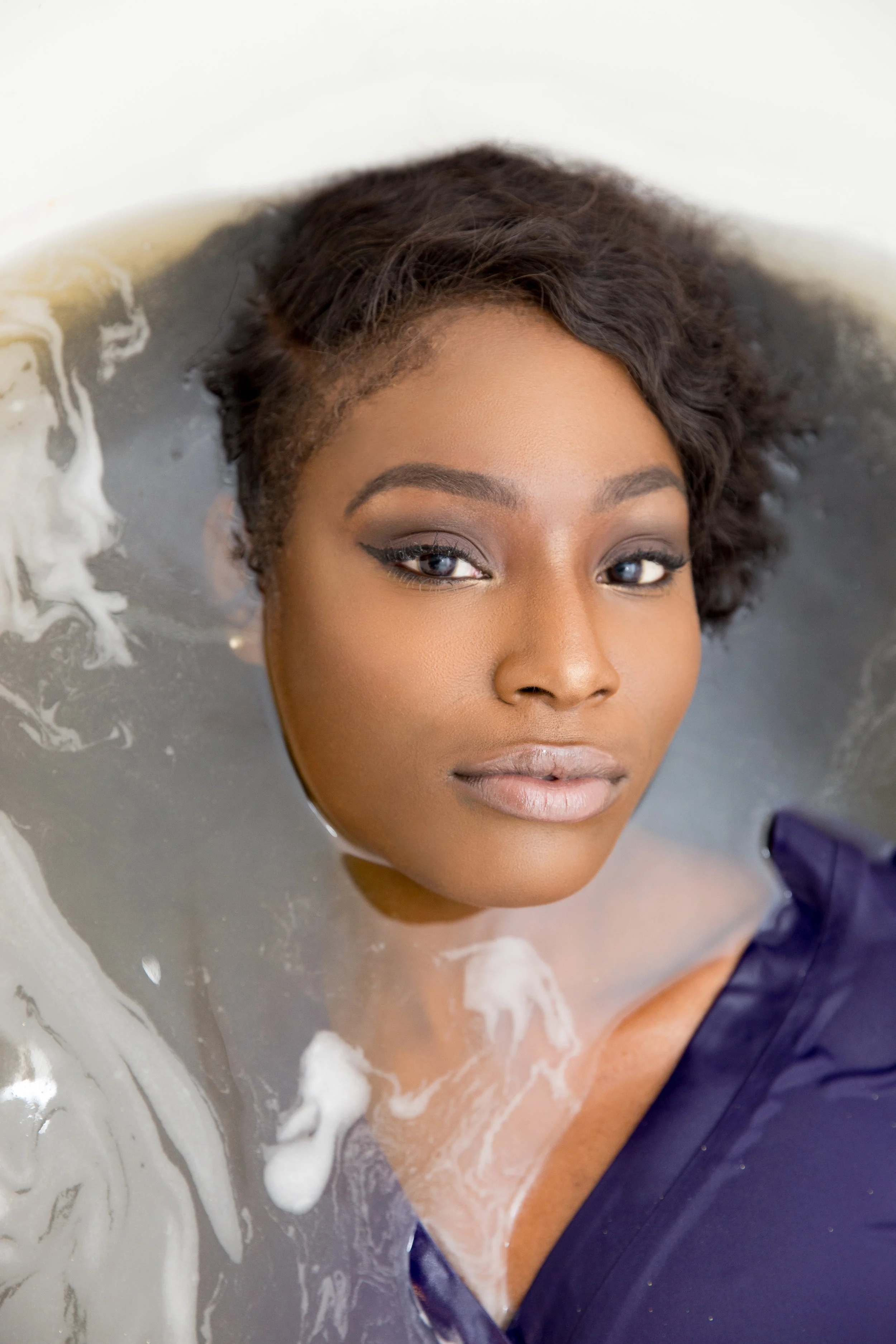 Alexis in a gold bath