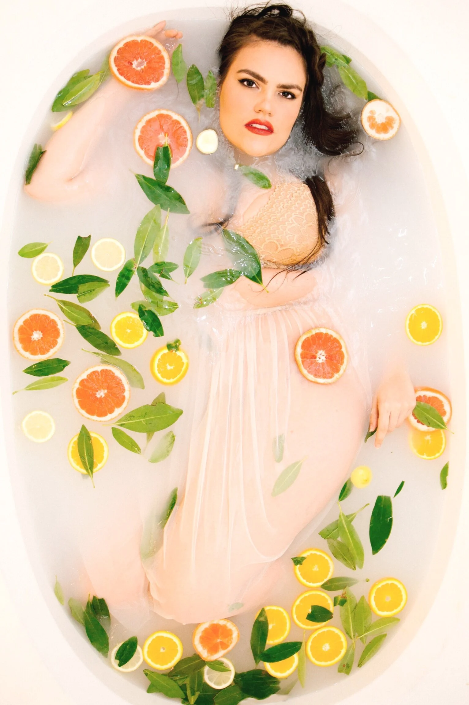 citrus fruit bath with grapefruit and oranges
