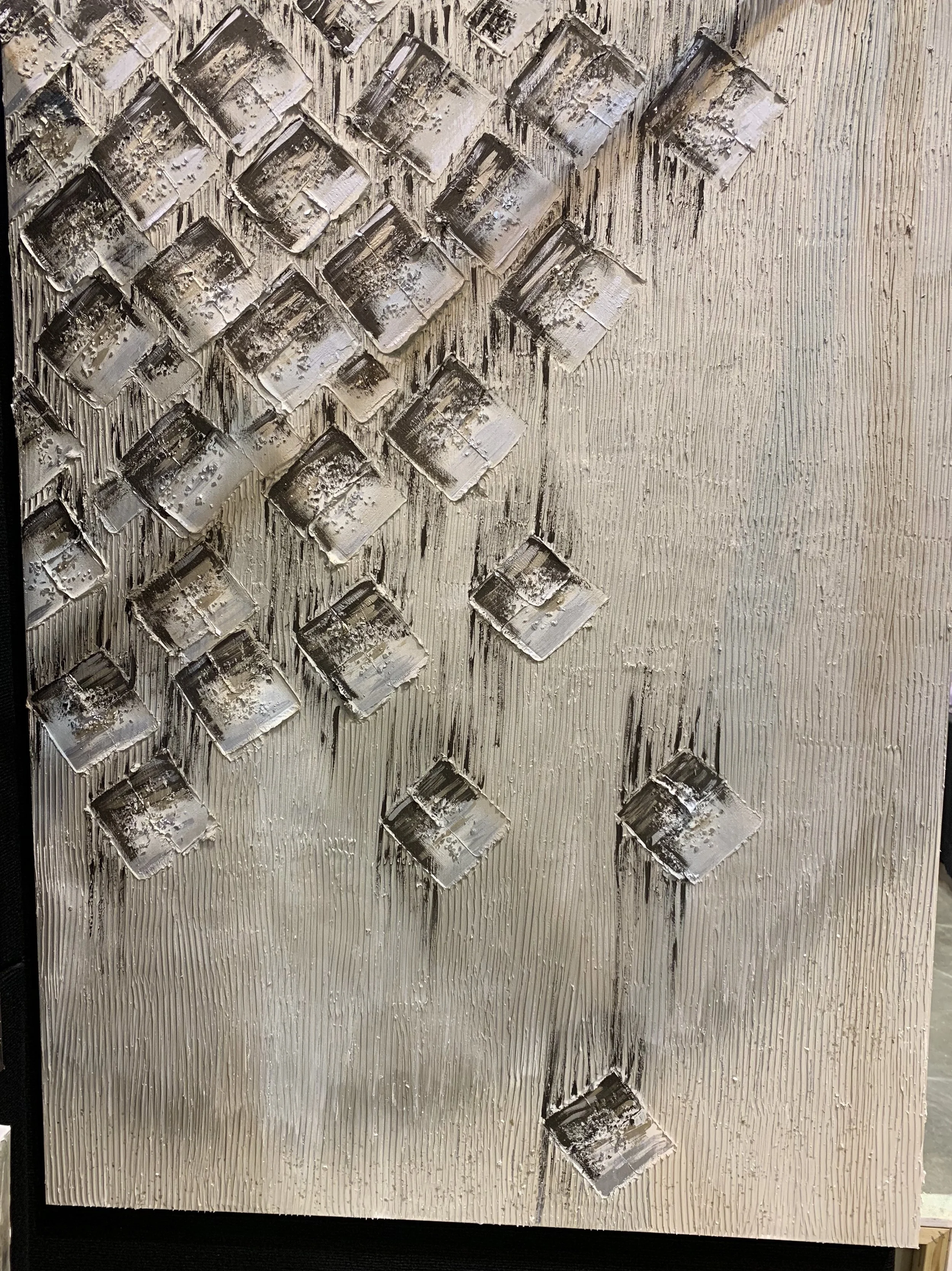 ‘Magnet’ attracts the bold and fearless. this stamped texture radiates down in all shades grey, silver, bronze and black. shown in a 36x48.