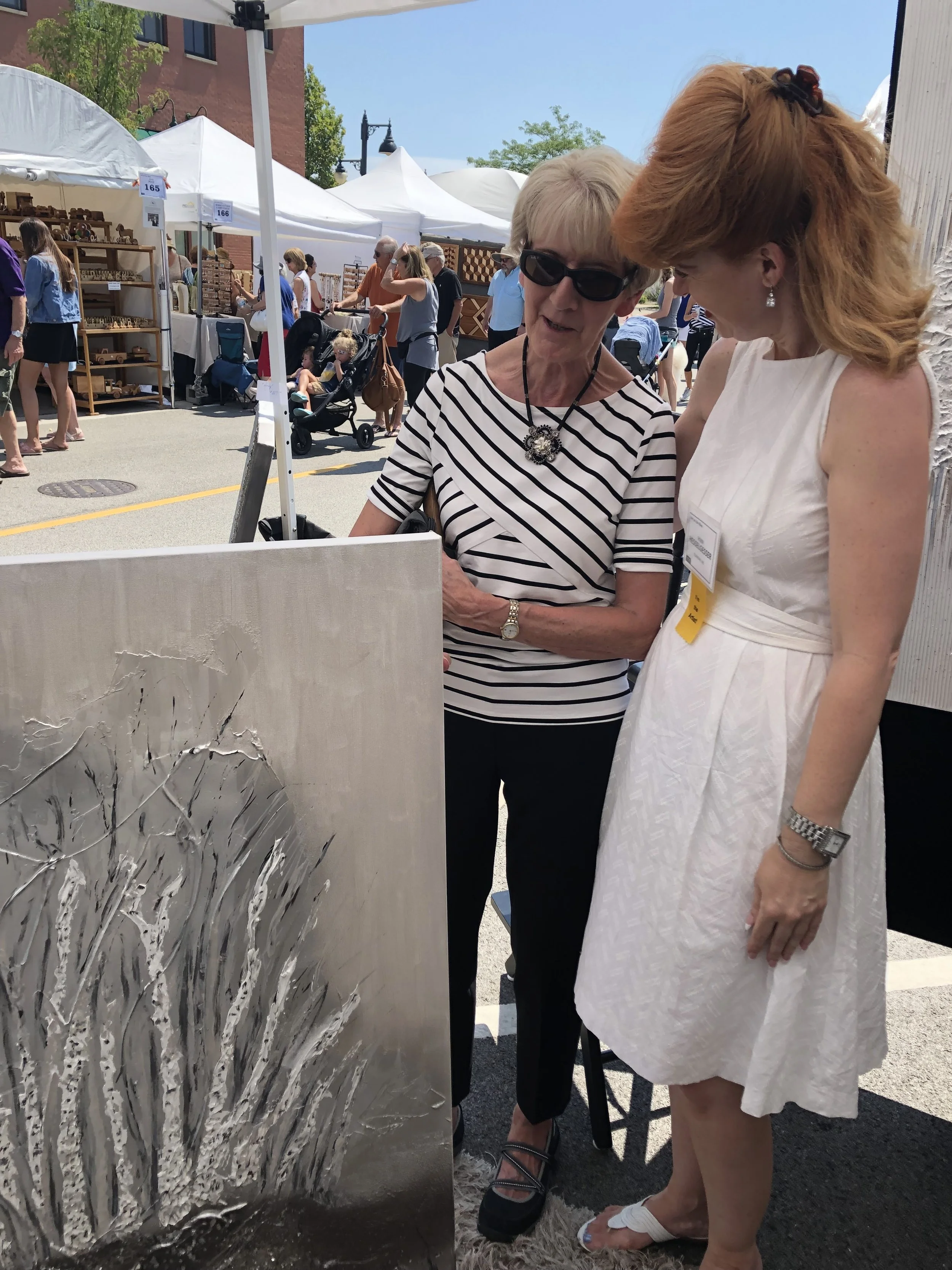 Robin selling artwork1.jpg