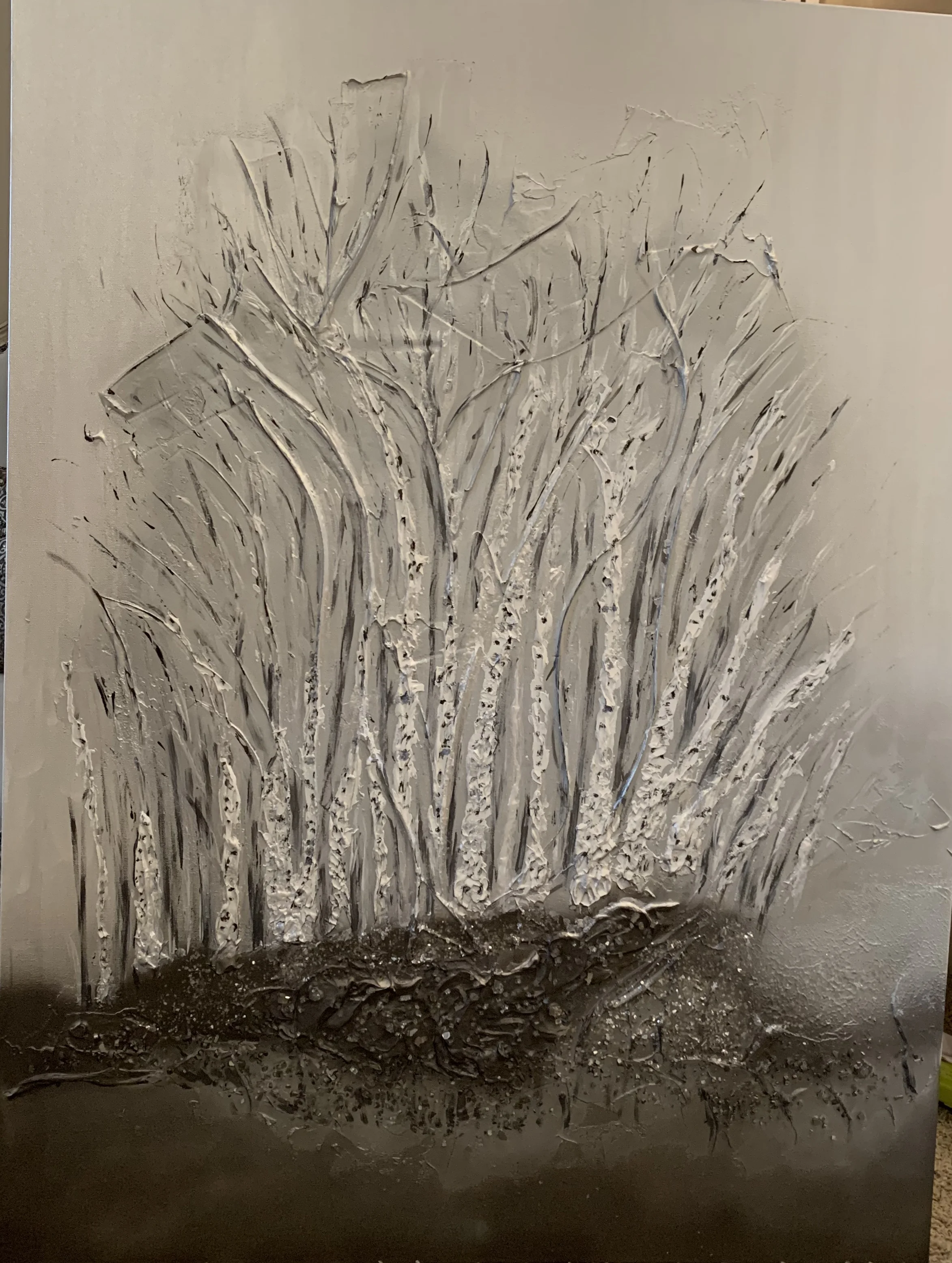 ‘Birch Bouquet’ is a group of contemporary trees set off in the distance with a shimmer of silver, grey, graphite with lots of dimension and sparkle.