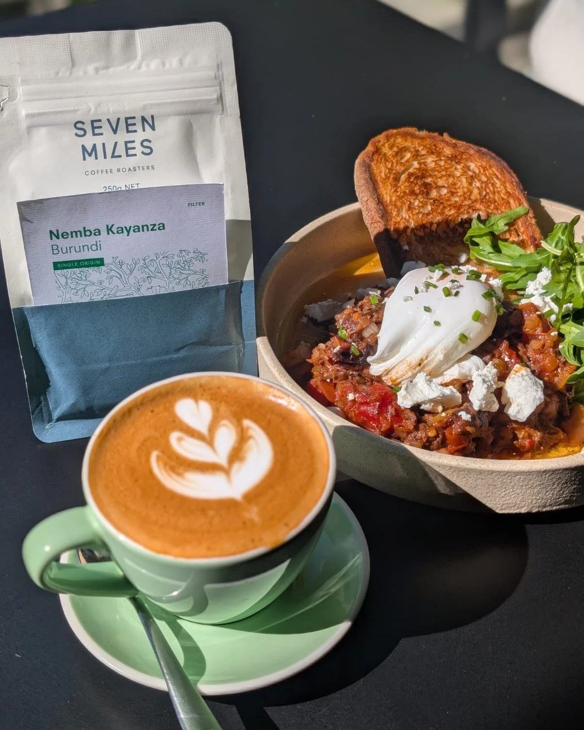 Brisket &amp; Beans is here for a week.

Slow-braised brisket and house-made baked beans, crowned with a perfectly poached egg, crumbled feta and peppery rocket, served alongside toasted sourdough.

Perfectly paired with @sevenmilescoffeeroasters' ne