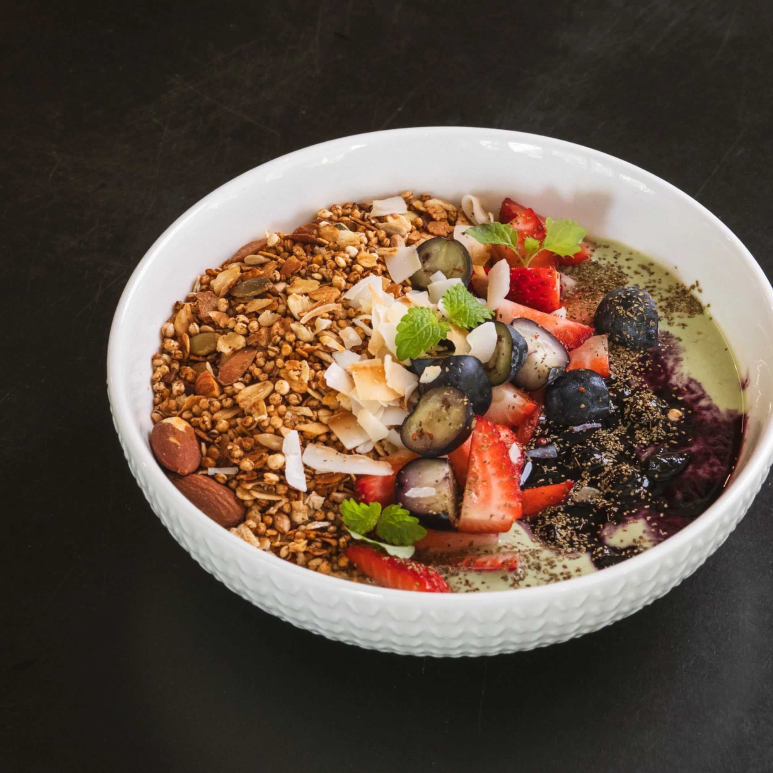 Smoothie bowl with granola, berries and coconut at ALL DAY café in West End Brisbane