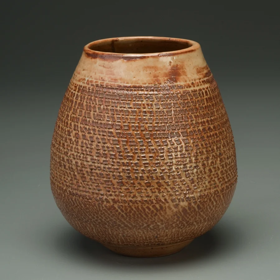  Large textured vase with shino glaze, reduction. 