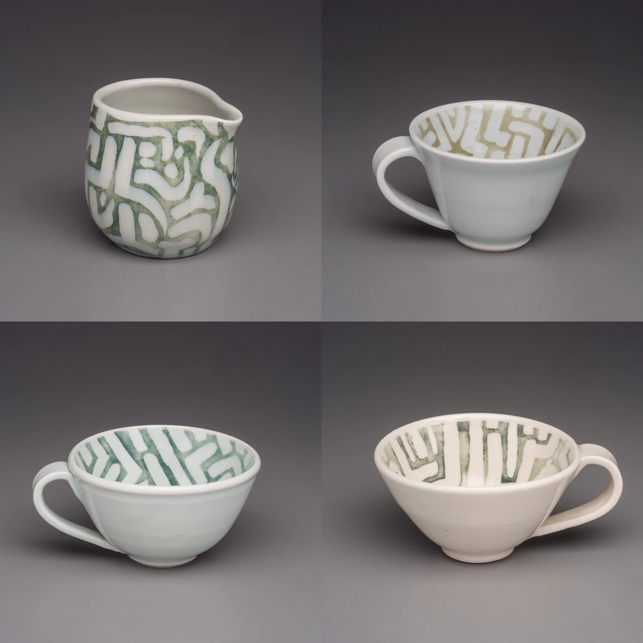  Porcelain water etched tea cups and creamer, colored slips with celadon glaze. 