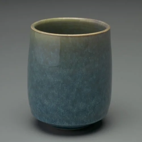 Porcelain teacup with toshiko variant glaze cone 6 elecric.