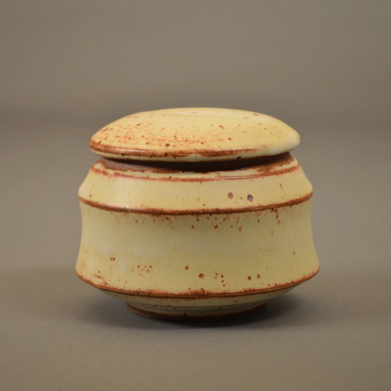  Small stoneware jar with spodumene glaze.&nbsp;Reduction cone 6-8 