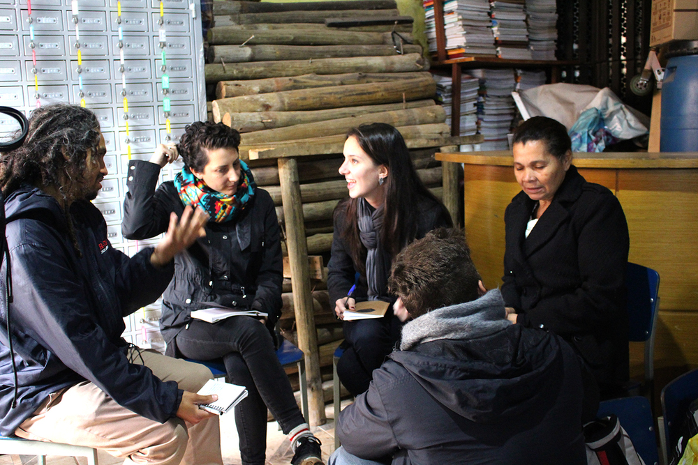 Fellows Alex, Isabel, Natalia, Victor and community leader Lia having a deep chat