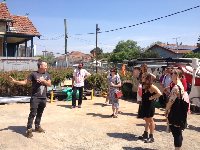 Monkey Marc showing the Fellows his Solar Powered Studio