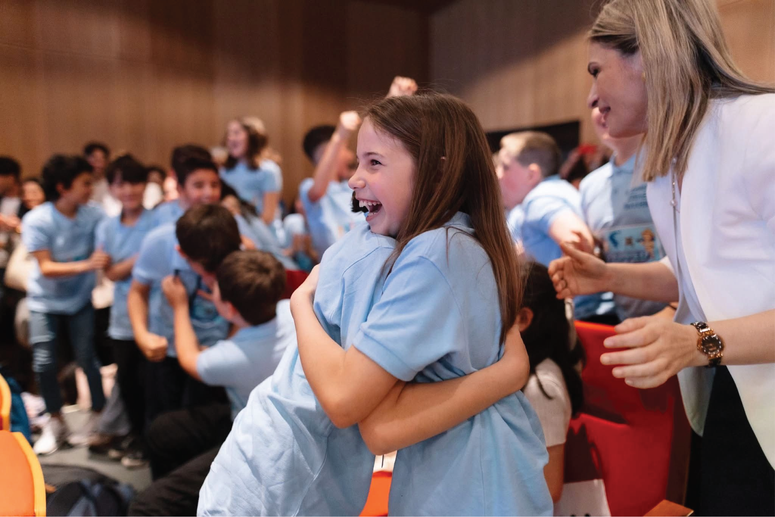 Young students celebrating.png