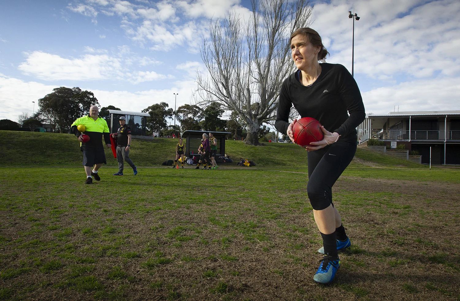A rare daylight training session, with coach Peter “Pants” Nash in the background. Mostly the team trained on Wednesday evenings. Their dedication shone through, even on miserable winter nights.