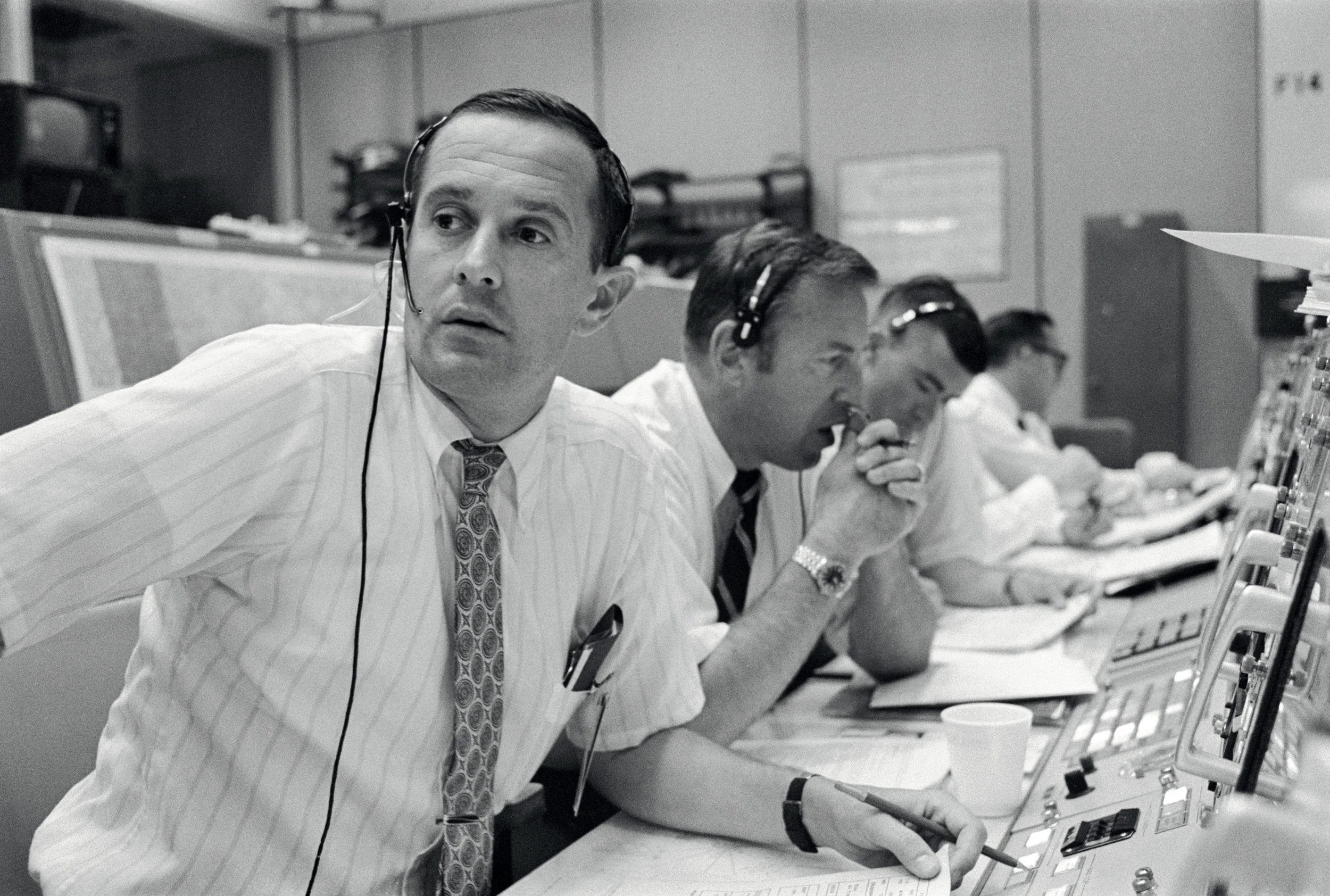 Duke, Lovell, and Haise at the Apollo 11 Capcom, Johnson Space Center, Houston, Texas