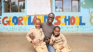 Kareem with Abdul (left) who he sponsors. Abdul’s sister (right) is also being sponsored.