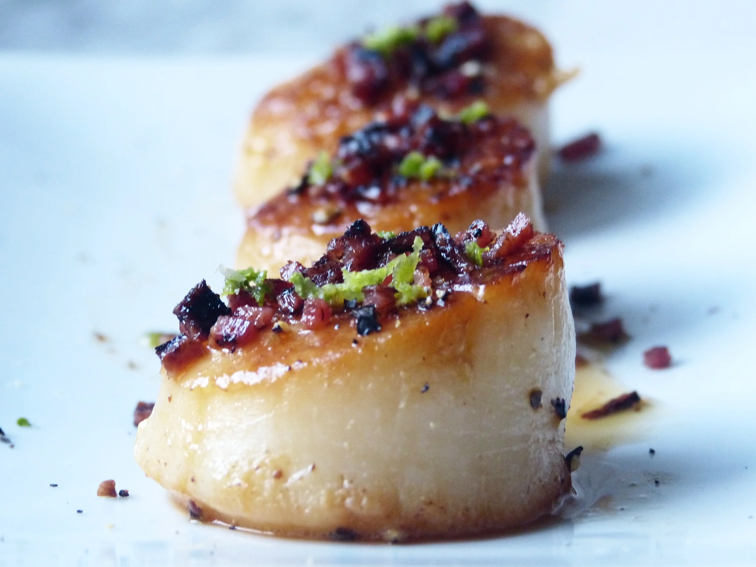 Citrus Honey Scallops with a Bacon Peppercorn Crumble