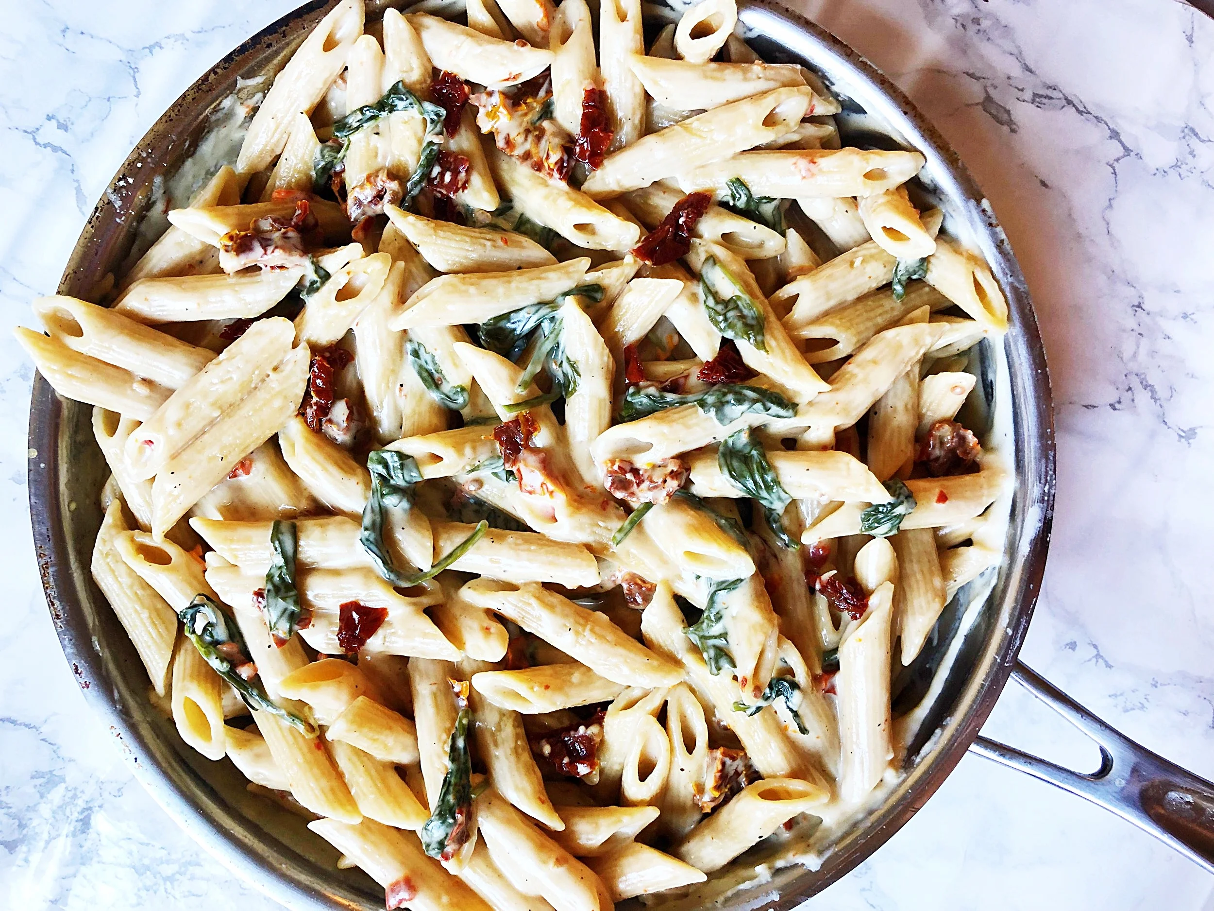 Spinach Sun Dried Tomato Pasta In A White Wine Parmesan Cream Sauce Pink Blonde Baking