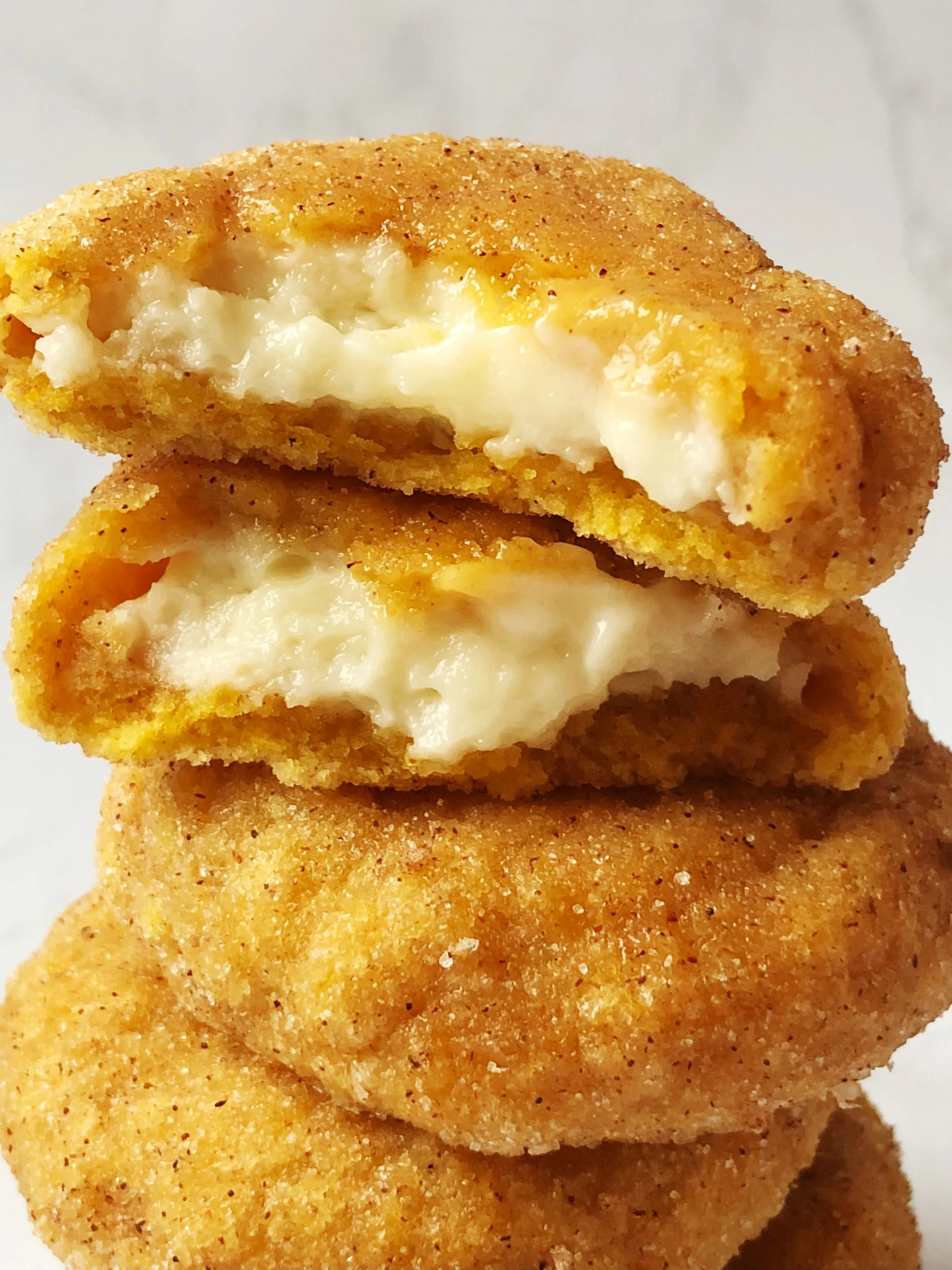 Cheesecake Stuffed Pumpkin Spice Snickerdoodle Cookies