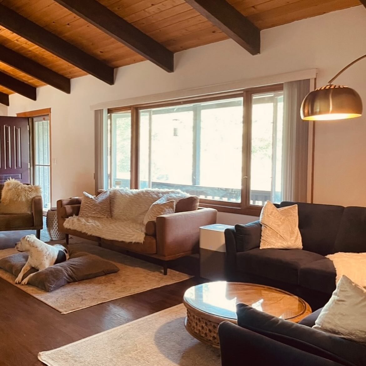Living Room

The Living Room needed a lot of work. It was covered in over-done resawn wood designs and there were no walls behind those, just insulation. The walls that did exist had not been painted in 40 years and were oil-based. There was also a m