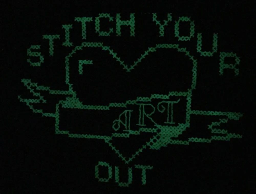 Scroll below to see what this says with the lights on (and to download the pattern for FREE!) 