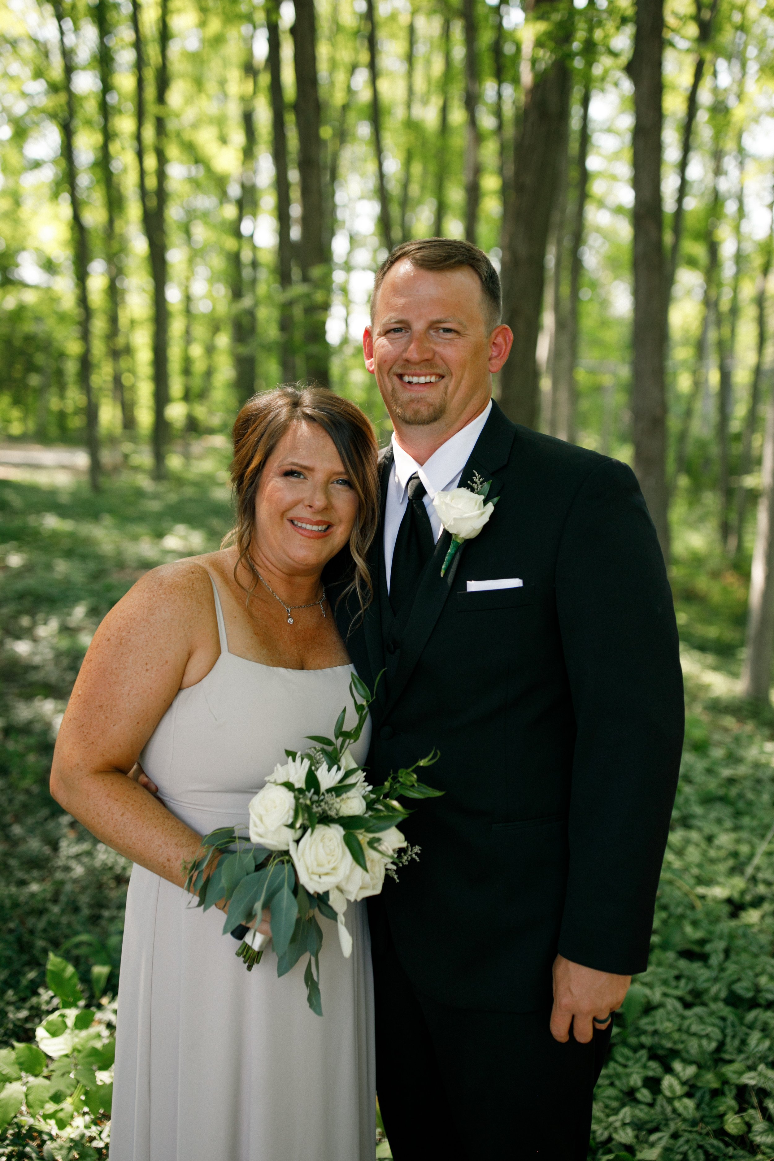 Josh and Erica Wedding Preview - Shanty Creek Wedding - Northern Michigan Wedding Photographer - J Darling Photo_058.jpg