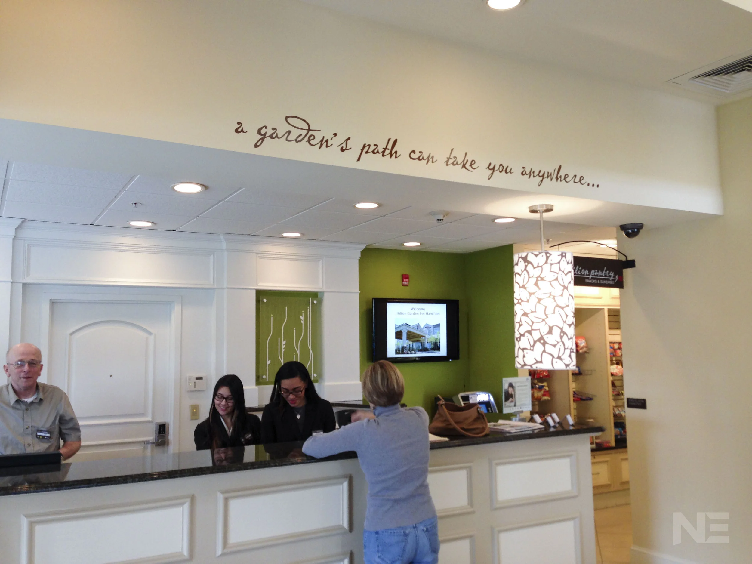 Hilton Garden lobby graphics - simple vinyl wall lettering.jpg