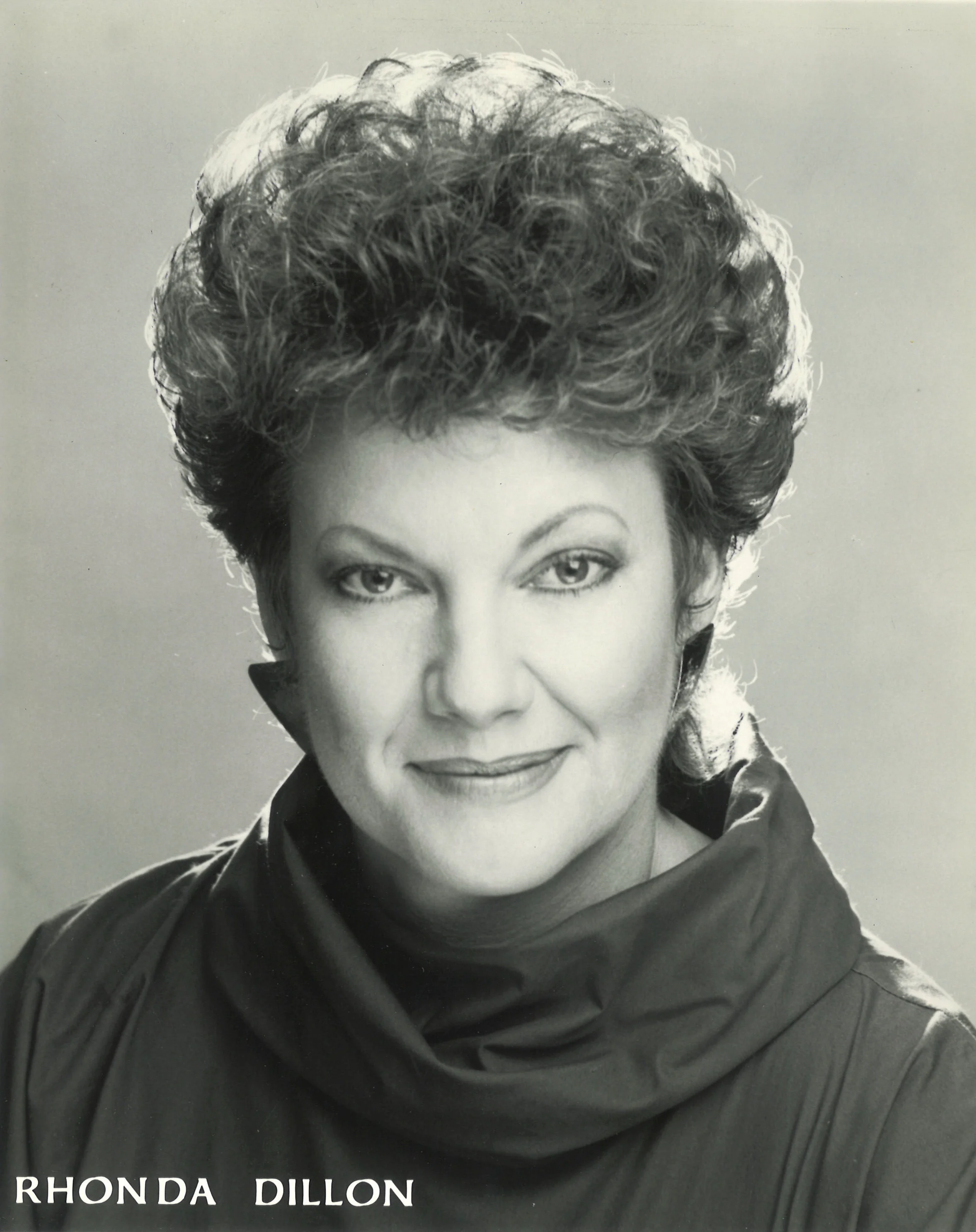 Versatile singing actress, Rhonda Dillon, made her Broadway debut in 1988 in Sir Andrew Lloyd Webber’s The Phantom of the Opera. She has subsequently appeared as both the prima donna “Carlotta” and the ballet mistress “Madame Giry” with every company in the United States! She holds a master’s degree in choral conducting from the University of Southern California, where she toured Australia and New Zealand as a member of the USC Chamber Singers. She has sung with the LA Opera and was a featured nun in The Firey Angel by Prokovief. With the Los Angeles Master Chorale, she was a featured soloist at the Hollywood bowl. She toured the Western US as soloist with the Roger Wagner Chorale. Her voice can be heard on the soundtracks of such films as Infidelity; Like Father Like Son; Burglar and Empire of the Sun. Most recently Ms. Dillon created the role of Brenda in Life Begins Again . Rhonda teaches at Cerritos College, El Camino College and College of the Canyons. She is on the board of NATS-Los Angeles as a director. Many of her students have won prestigious awards and are studying and teaching a new generation of singing artists!
