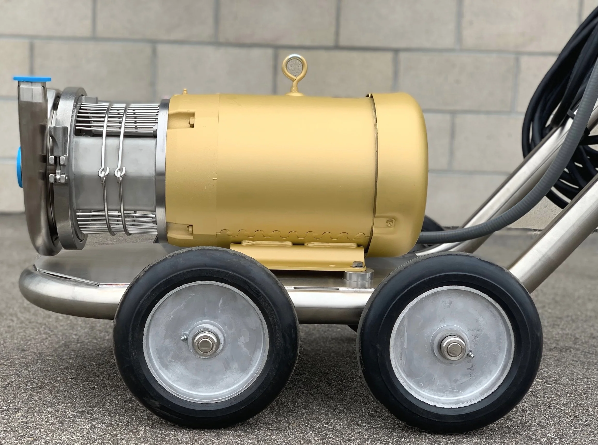 • WAUKESHA MODEL #C218 SANITARY CENTRIFUGAL PUMP • DG SINGLE MECHANICAL SEAL, CARBON VS. SILICONIZED GRAPHITE • 2.0" x 1.5" TC FITTINGS • PUMP CLOSE COUPLED TO A 3500 RPM 7.5HP BALDOR MOTOR • INPUT POWER: 460VAC/60HZ/3-PHASE • PUMP AND MOTOR MOUNTED TO PEI STAINLESS STEEL 4 WHEEL PUMP CART WITH 2 CORD WINDING HOOKS • PUMP CONTROLLED BY VACON MODEL# X4C40075C 15HP MOTOR SPEED CONTROLLER (460VAC) • INCLUDES 50-FOOT CORD; DOES NOT INCLUDE POWER PLUG • DOWNLOAD PUMP CURVES (7.5,15 & 20 HP)