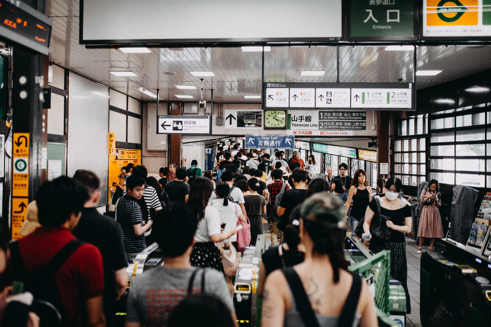 Inside a crowded subway station near Harajuku and Yoyogi Park in Tokyo Japan full of people