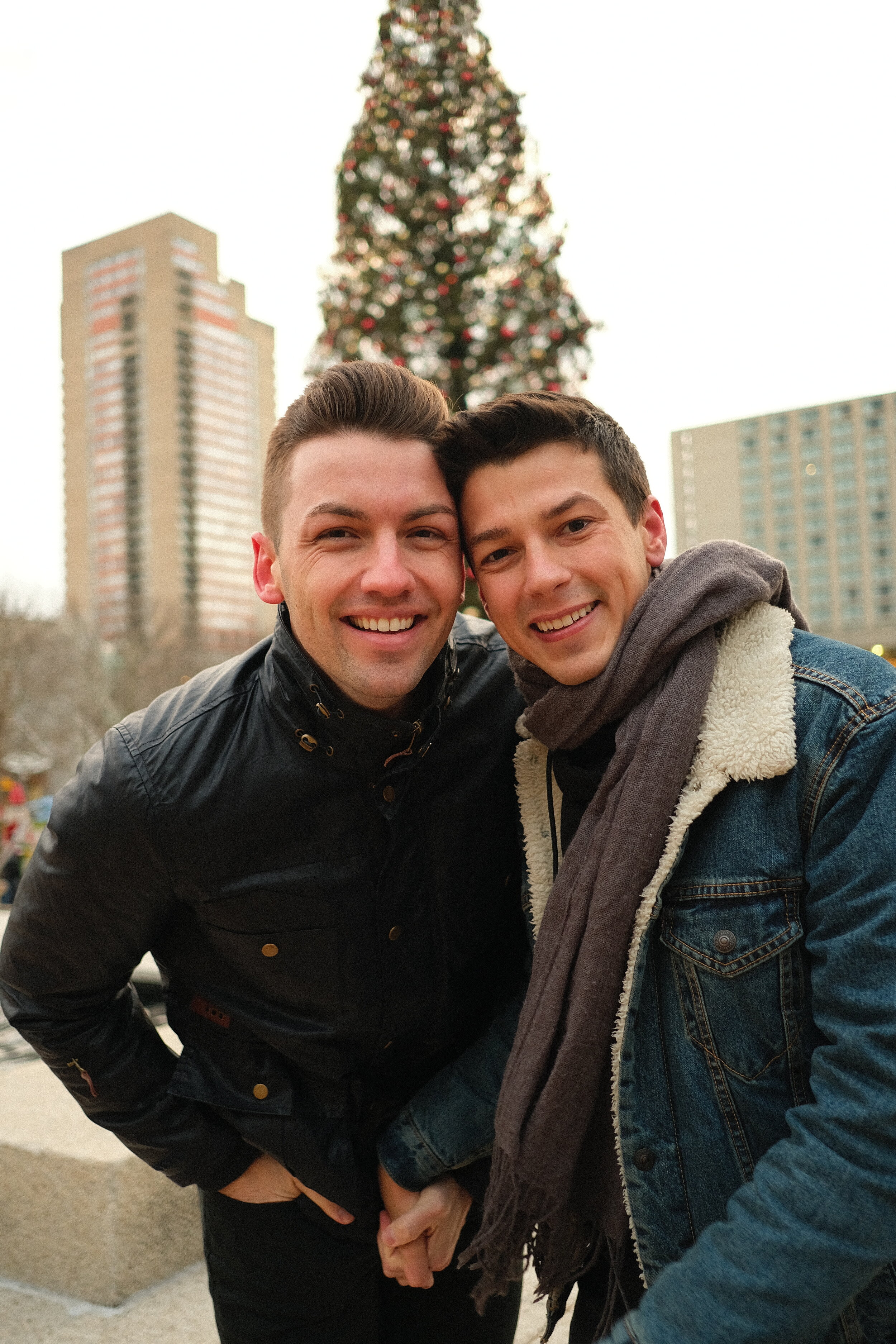 Gay Couple with Christmas tree in Crown Center Kansas City.JPG