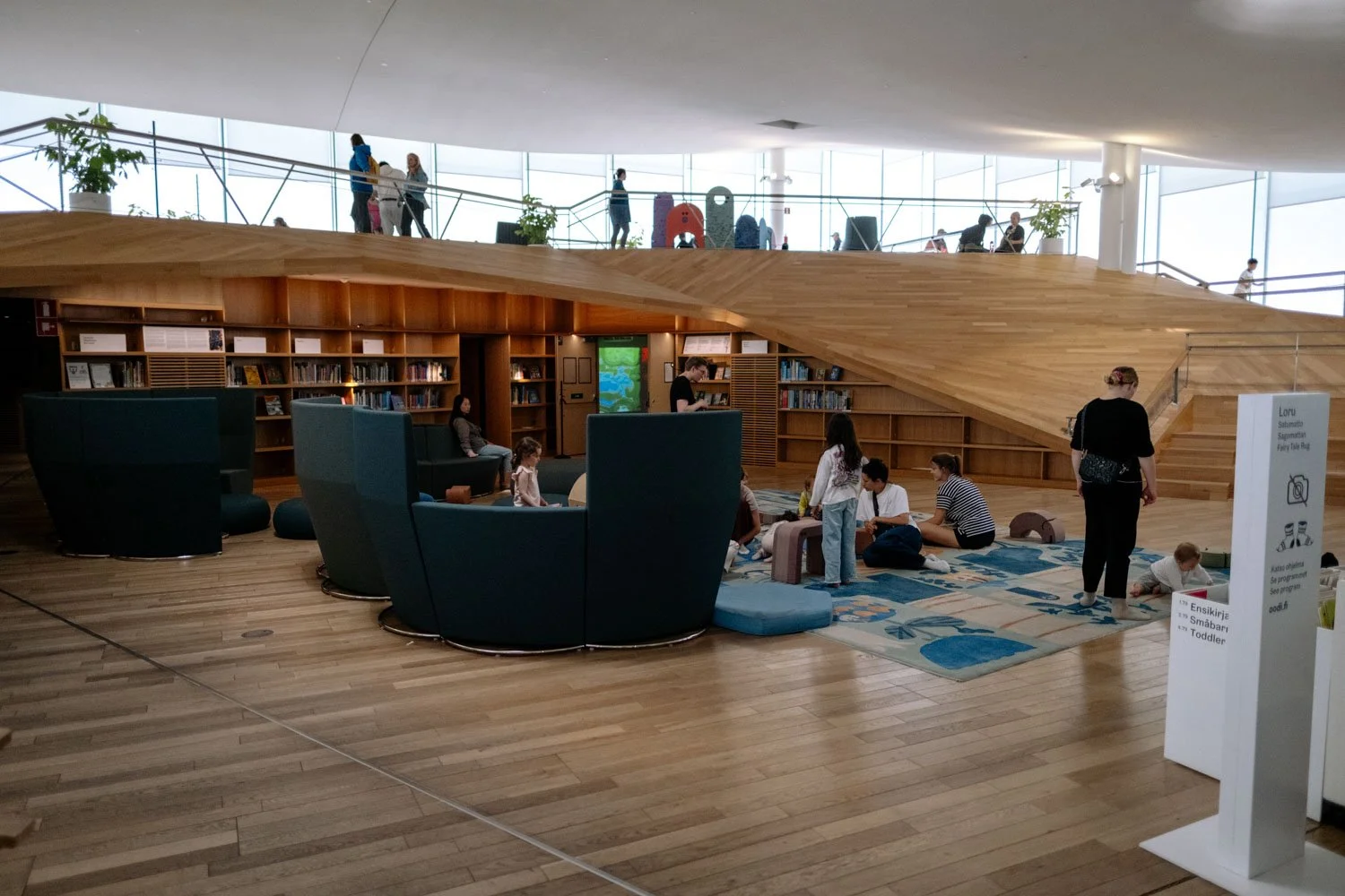 interior or Oodi Library with large windows and children's play area.jpeg